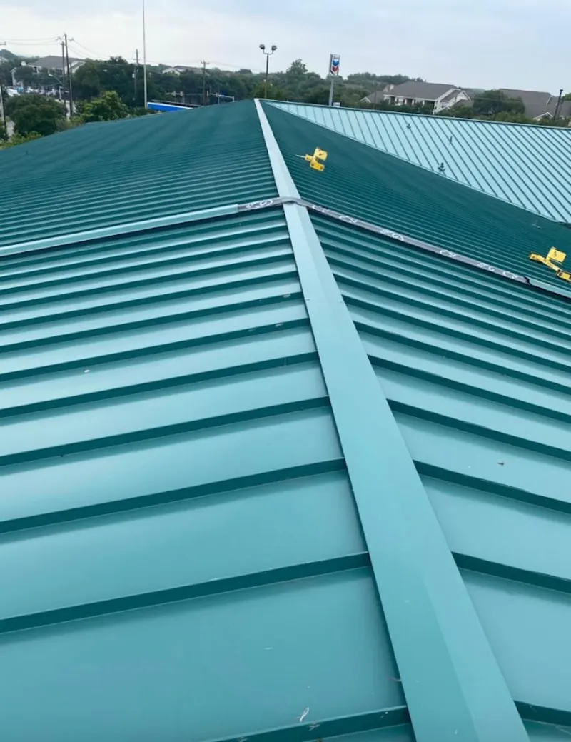 Green commercial metal roof ridge and valley for Metal Roof Repair in Springdale