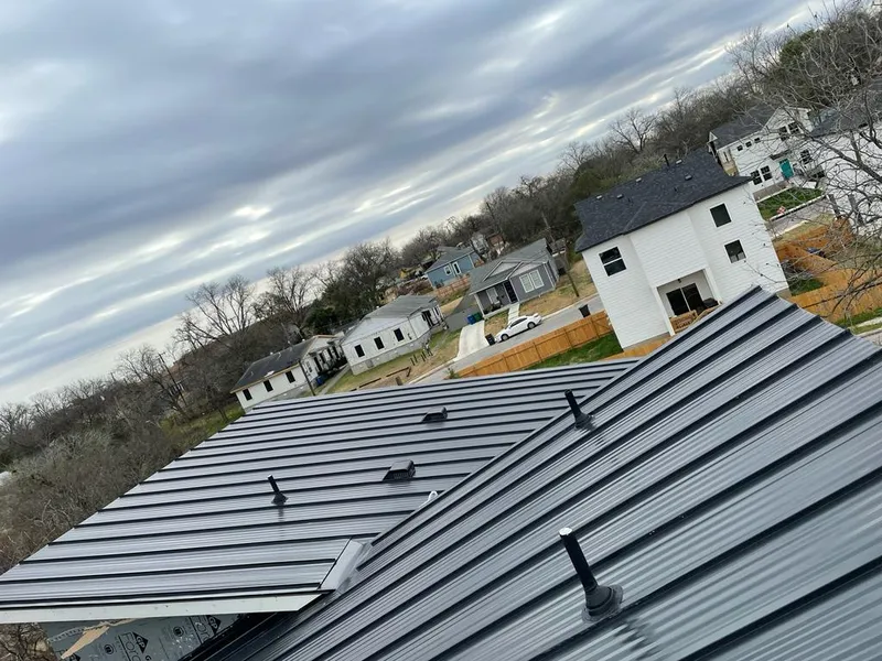 Standing seam metal roof panels with vents for Skylight Repair in Springdale